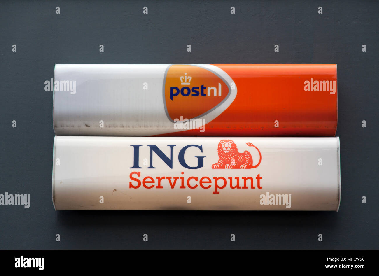 Mam Knorretje Oppositie Amsterdam,Netherlands-july 27, 2015: Ing service point and postnl shop in  Amsterdam Stock Photo - Alamy