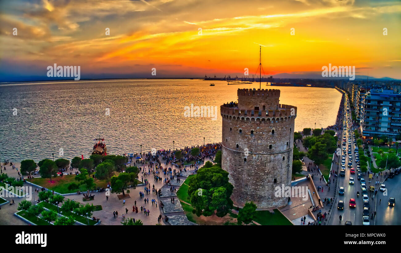 Aerial view of famous White Tower of Thessaloniki at sunset, Greece. Image taken with action drone camera. HDR image Stock Photo