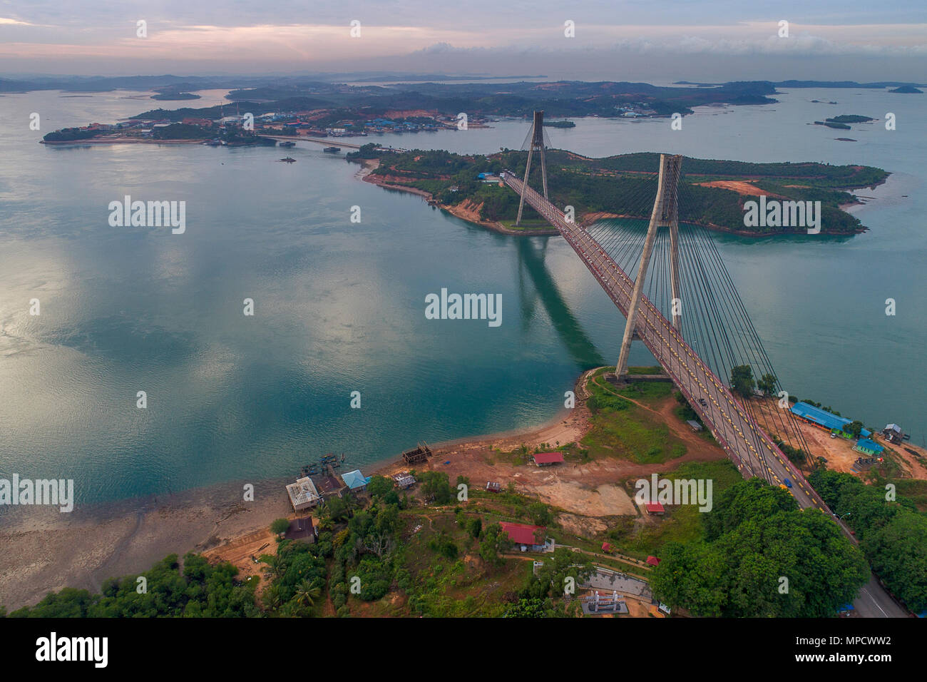 Aerial view of Barelang Bridge a chain of six bridges of various types that connect the islands of Batam at sunrise, Indonesia Stock Photo