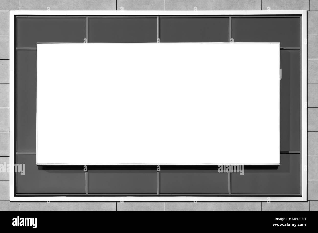 Blank horizontal billboard on glass facade. Background for mock-up. Stock Photo