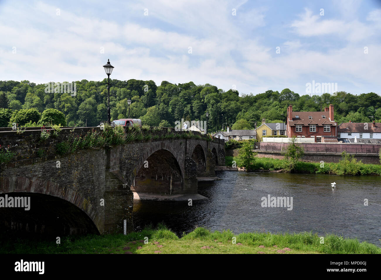 Pictures taken around the historic town of Usk in South Wales, showing the town square and clock,   River Usk,   Emporium in Bridge Street, police stn Stock Photo