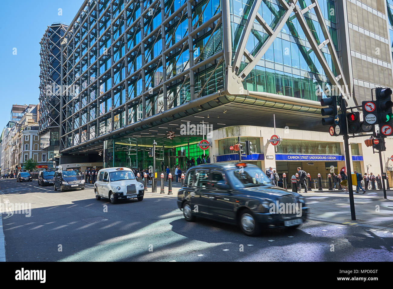 London Cannon Street railway station and passing iconic London taxi's Stock Photo