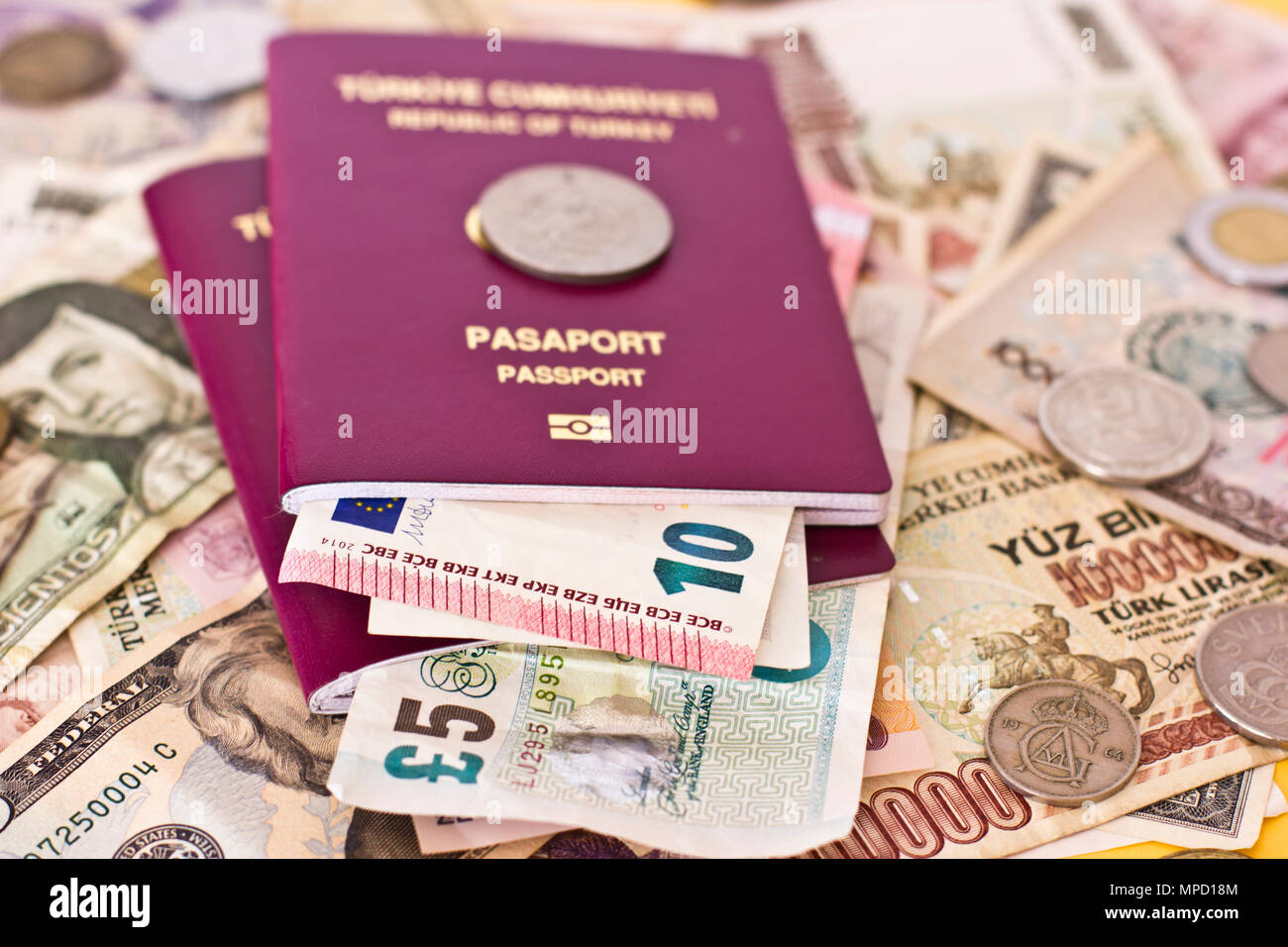 Foreign passports and money from the countries Stock Photo Alamy
