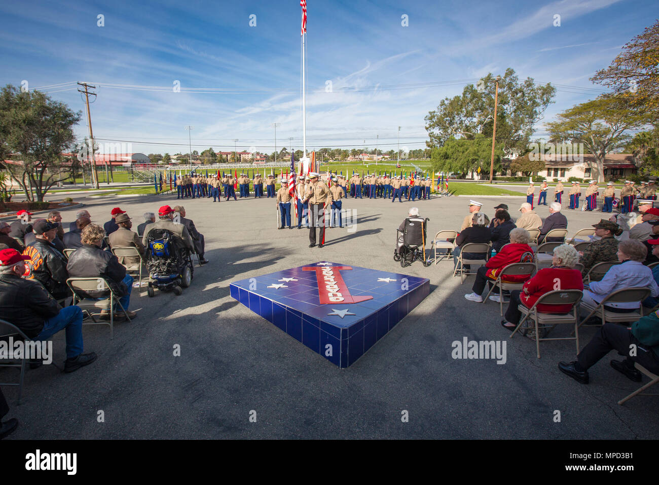 U.S. Service members and Veterans attend the 76th anniversary of 1st Marine Division on Marine Corps Base Camp Pendleton, Calif., Feb. 2, 2017. Veterans, active duty Marines and Sailors who served in the division over the years participated in the ceremony celebrating the oldest, largest, and most decorated division in the Marine Corps. (U.S. Marine Corps photo by Lance Cpl. Rhita Daniel) Stock Photo