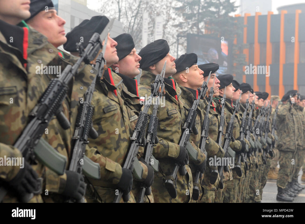 Polish Soldiers assigned to 23rd Field Artillery Regiment stand in formation during a celebration ceremony to welcome American troops to Bolesławiec, Poland, Feb. 5, 2017. The celebration was an opportunity for the Polish citizens to welcome the Soldiers of 588th Brigade Engineer Battalion, 3rd Armored Brigade Combat Team, 4th Infantry Division. The 3-4 ABCT’s arrival marks the start of back-to-back rotations of armored brigades in Europe as part of Operation Atlantic Resolve. This rotation will enhance deterrence capabilities in the region, improve the U.S. ability to respond to potential cri Stock Photo