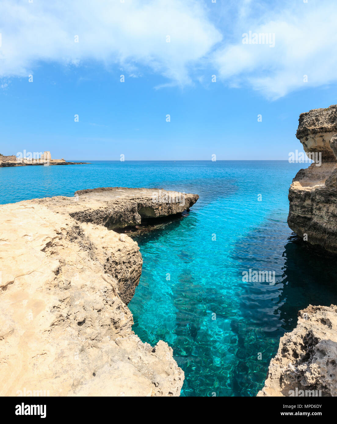 Picturesque seascape with white rocky cliffs, caves, sea bay and islets at Grotta della poesia, Roca Vecchia, Salento Adriatic sea coast, Puglia, Ital Stock Photo