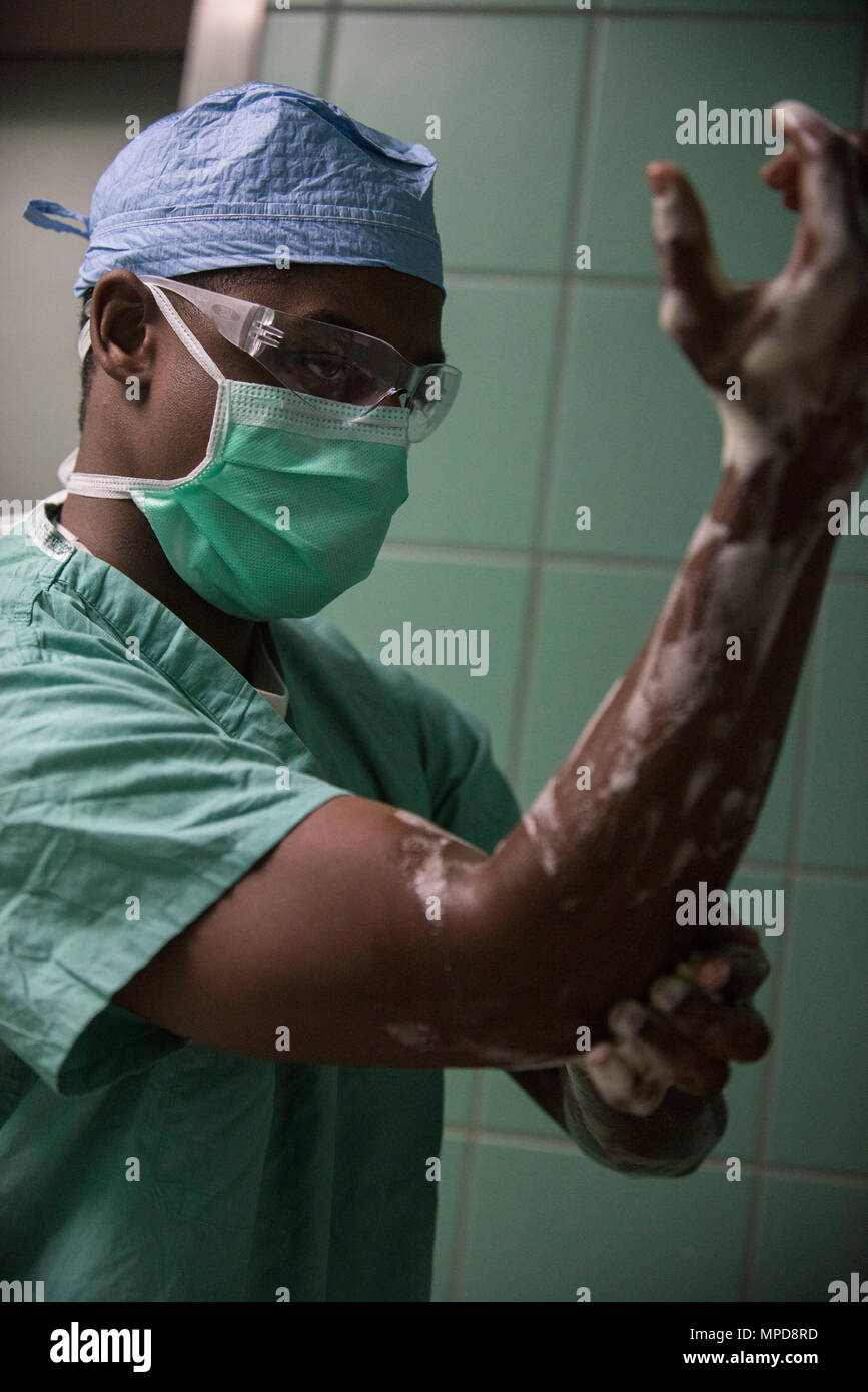 U.S. Army Sgt. Michael Harvey, an operating room specialist assigned to  Brooke Army Medical Center in San Antonio, Texas, conducts surgical hand  scrub prior to entering an operating room during Medical Readiness