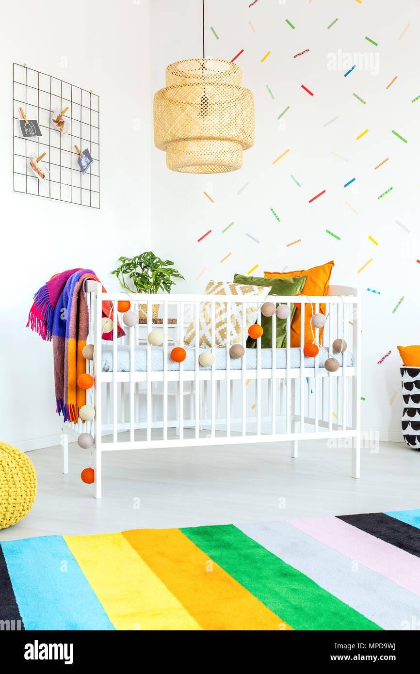 White wooden cot in a baby bedroom Stock Photo Alamy