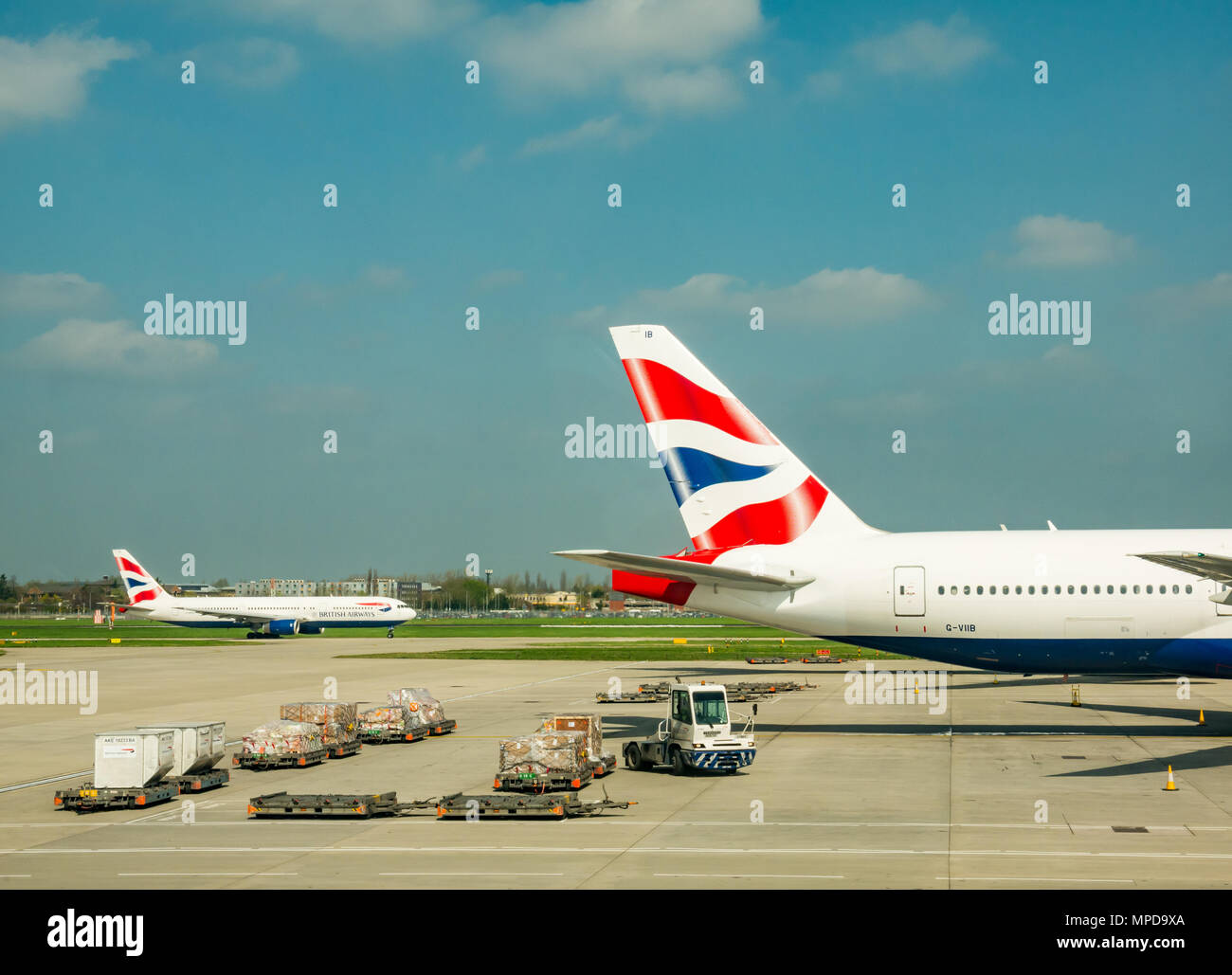British Airways planes, including a Boeing 777 on airport apron with