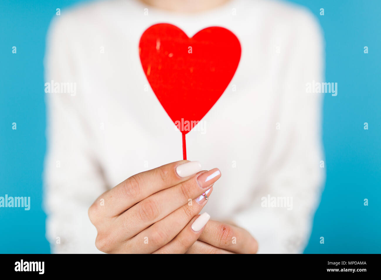 Woman hands holding heart hi-res stock photography and images - Alamy