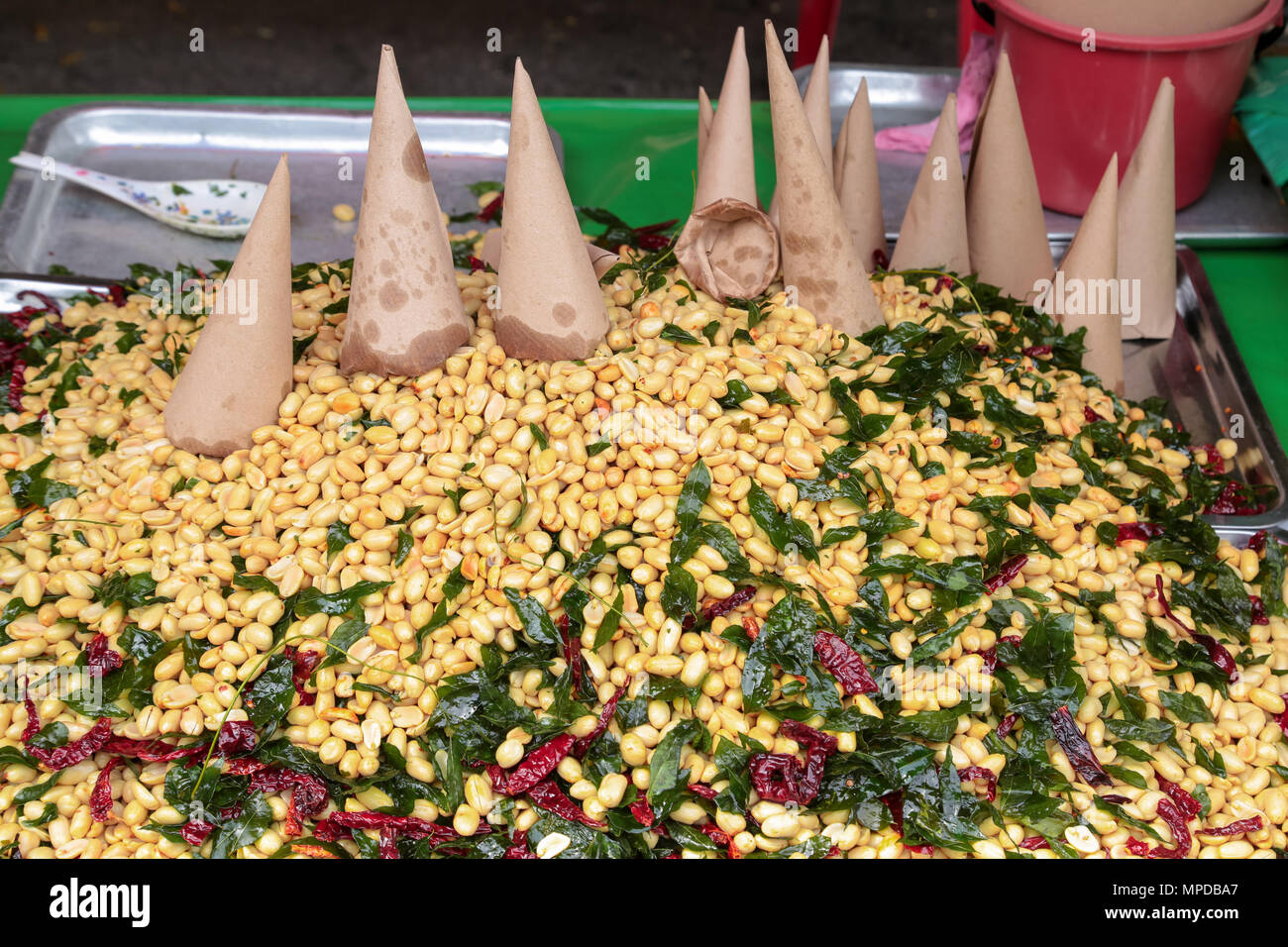 Hawker Stall Selling Nuts Packed In Paper Wrap Outside Maha Vihara Buddhish Temple Kuala Lumpur Malaysia On Wesak Day Stock Photo Alamy