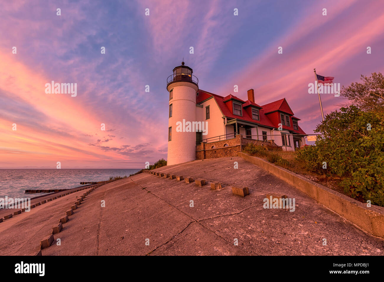 Lake Michigan sunset hues color Point Betsie Lighthouse, near Frankfort Michigan Stock Photo