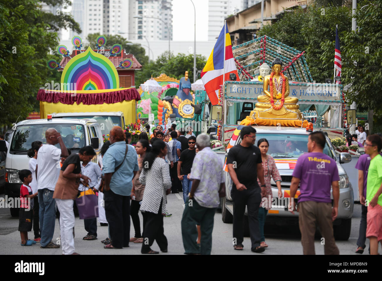 Beautifully decorated buddhish procession vehicles waiting outside Maha ...