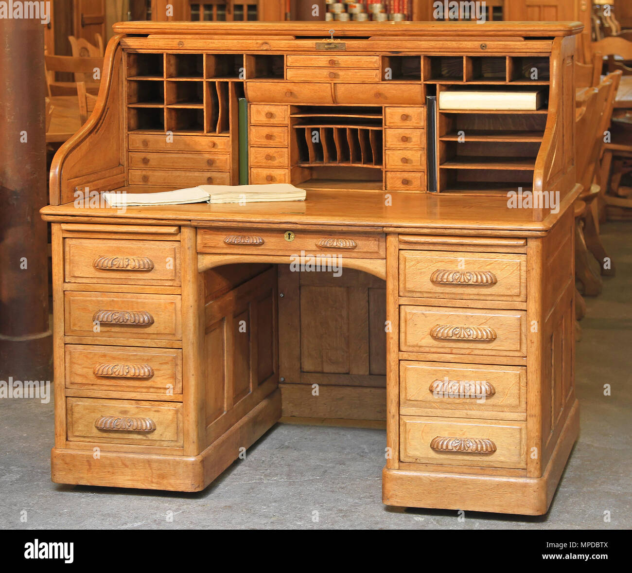 Vintage Secretary Oak Wood Desk With Roll Top Stock Photo