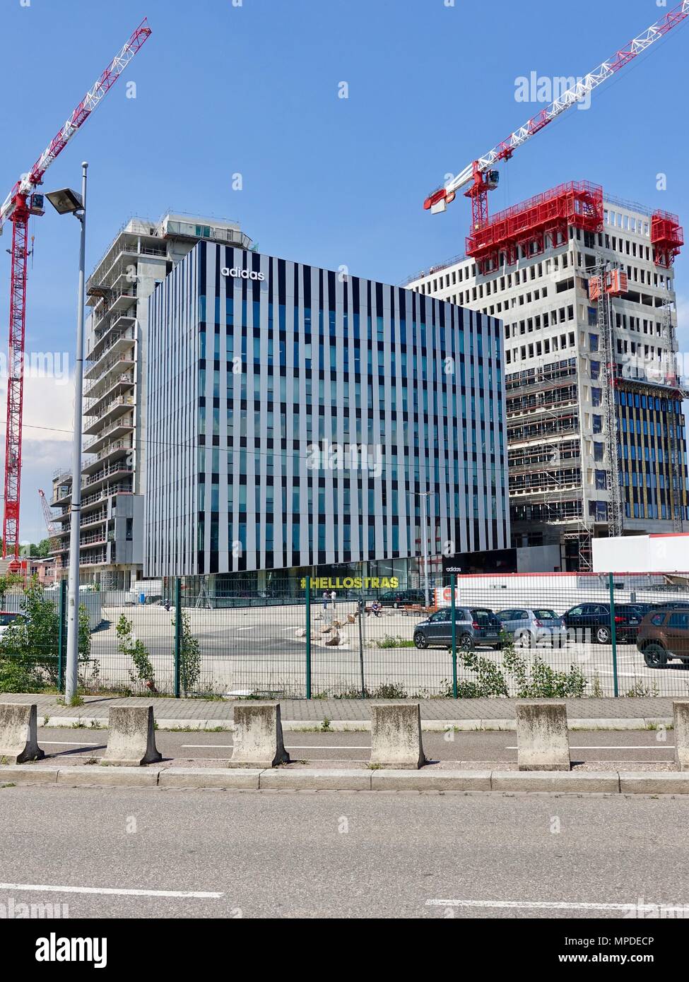 Completion of the new building for the Adidas Strasbourg, France  headquarters, and construction of other modern office buildings Stock Photo  - Alamy