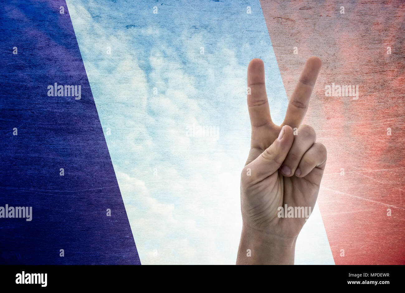 National symbol of victory: hand with two fingers with the flag of France Stock Photo