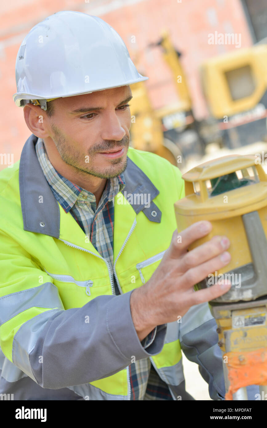electrician builder engineer checking data Stock Photo