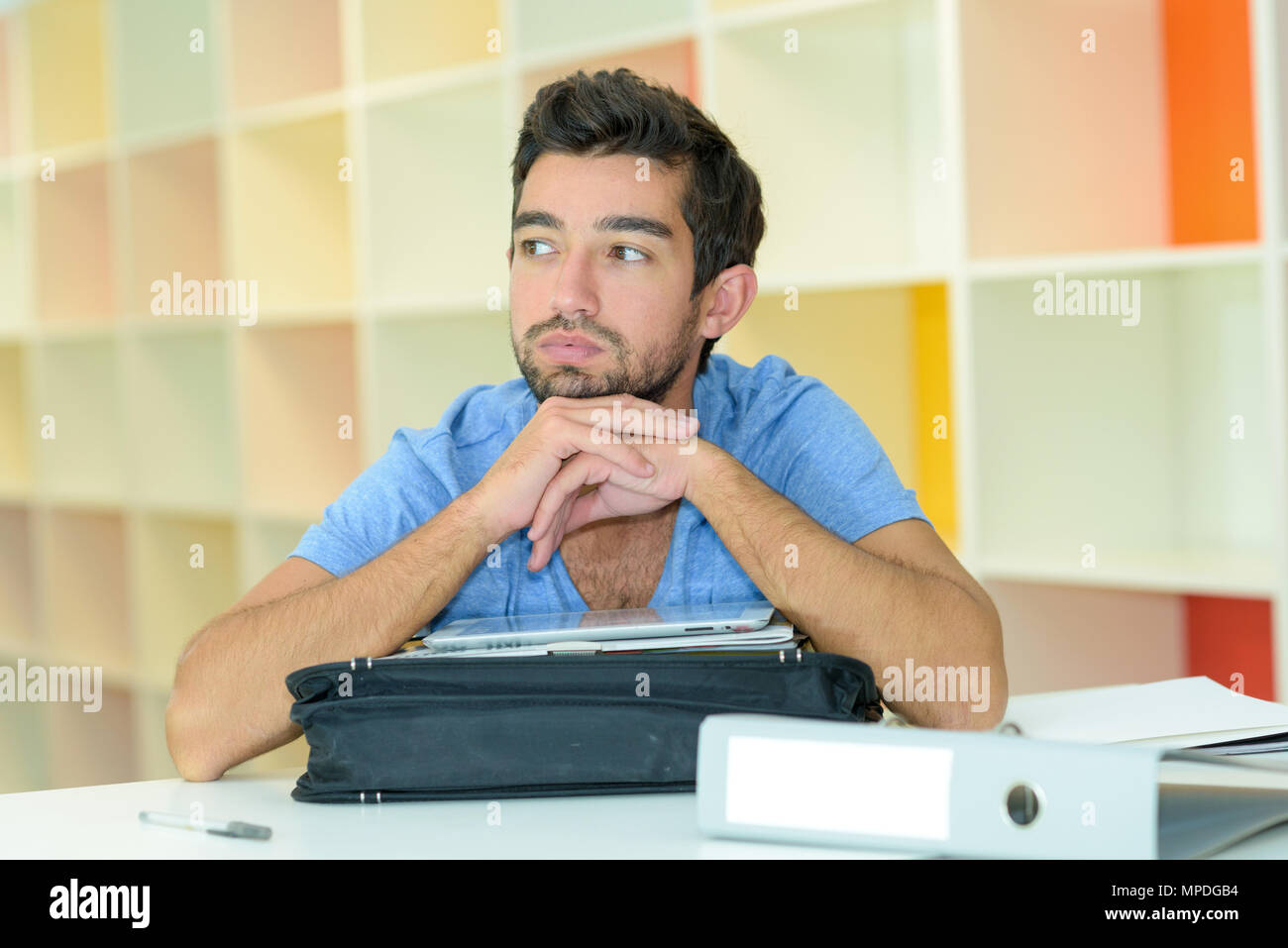 Man sighing with boredom Stock Photo