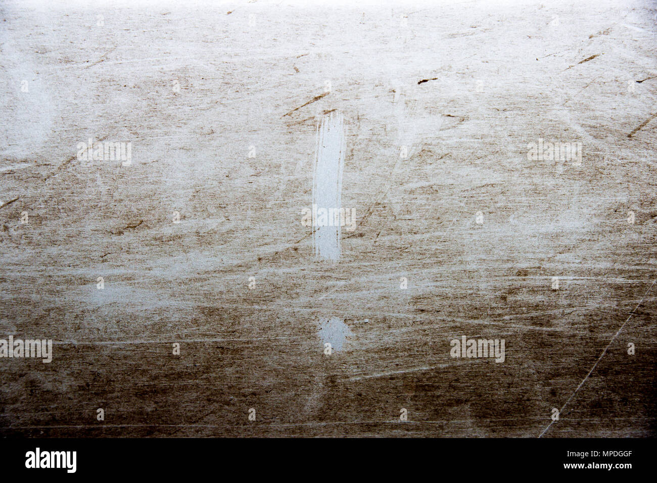 exclamation point is drawn on scratched dirty background Stock Photo