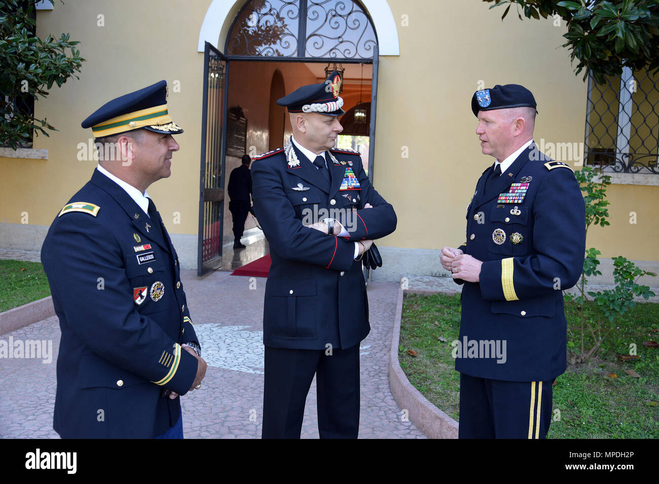 U.S. Army Col. Darius S. Gallegos (left), Center of Excellence for Stability Police Units (CoESPU) deputy director, Lt. Gen Vincenzo Coppola (center), deputy commander of the Carabinieri Corps, and Maj. Gen. Joseph P. Harrington (right), U.S. Army Africa Commanding General, during the visit NATO JFC-Naples Commander, Admiral Michelle Howard at the CoESPU Vicenza, April 10, 2017. Stock Photo