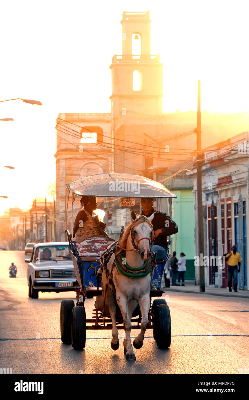 A horse-drawn taxi carriage early in the morning, Cienfuegos, Cuba, Caribbean Stock Photo