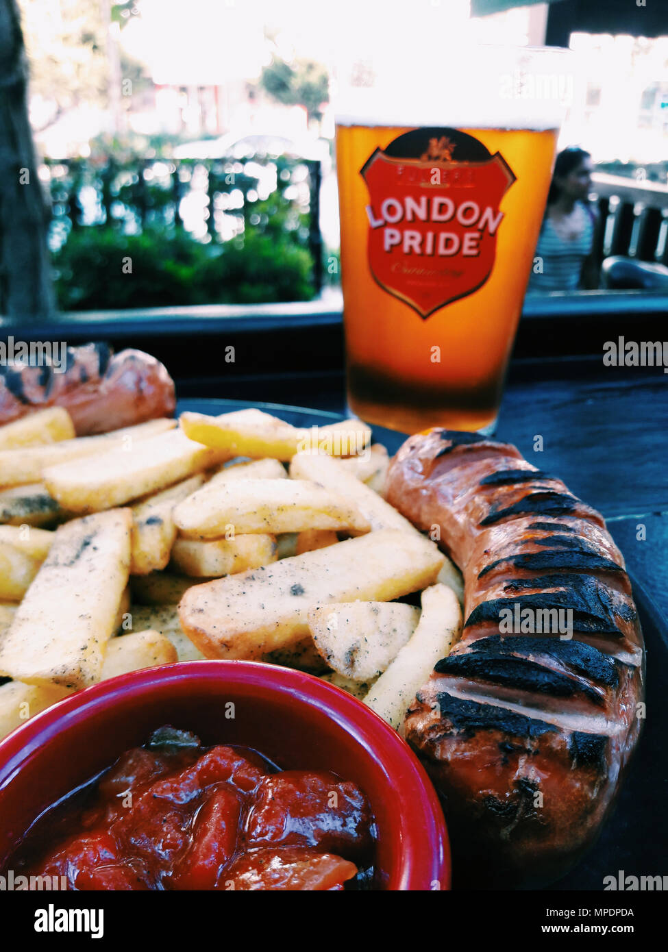 London Pride Beer with Frankfurter Sausage. fast food concept. Stock Photo