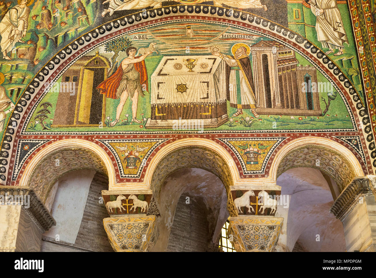 Ravenna, Ravenna Province, Italy. Mosaic in San Vitale basilica.  Abel and Melchizedek bringing their offerings to the sacrificial altar.  San Vitale  Stock Photo