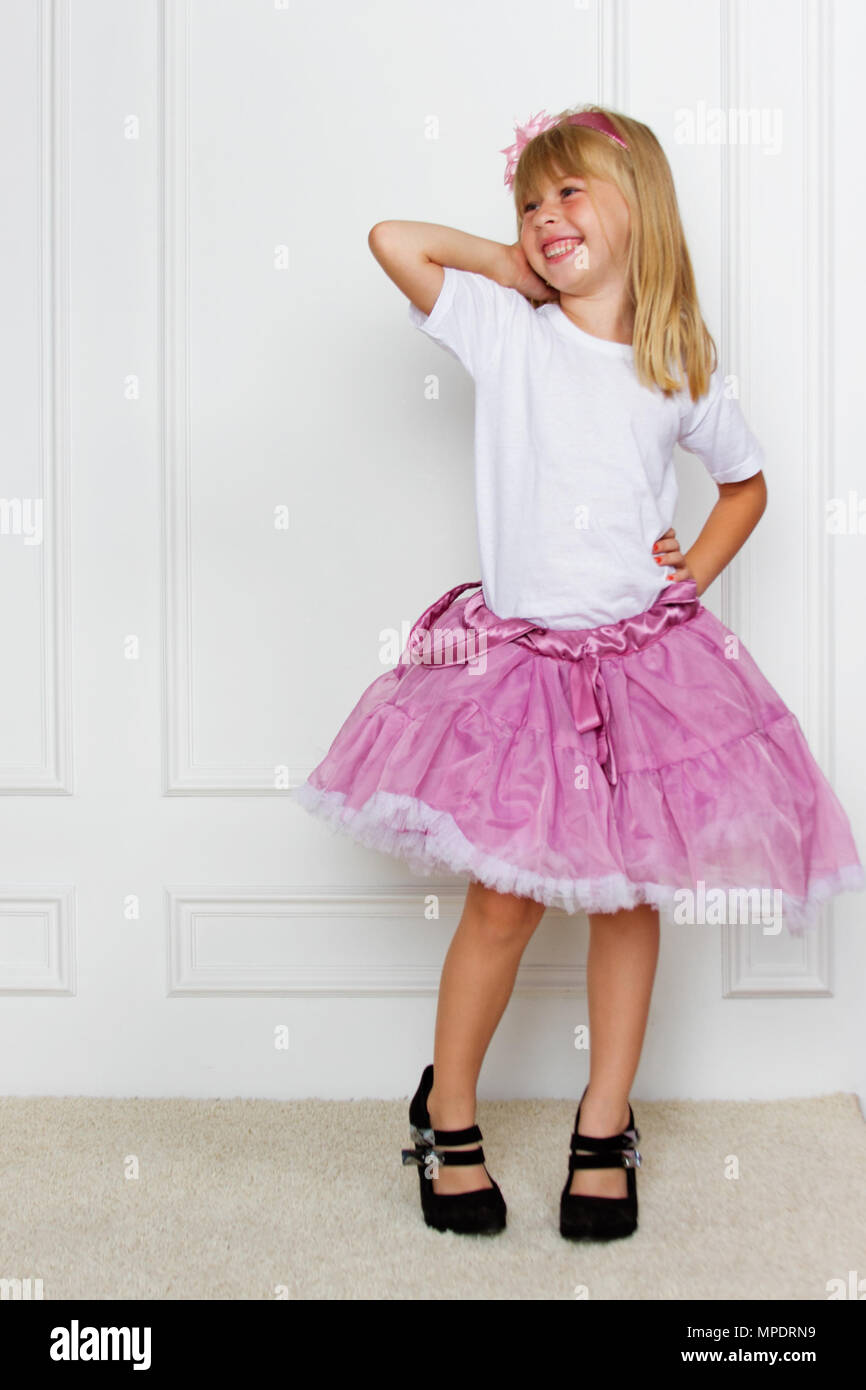 girl in a pink dress. studio shot Stock Photo - Alamy