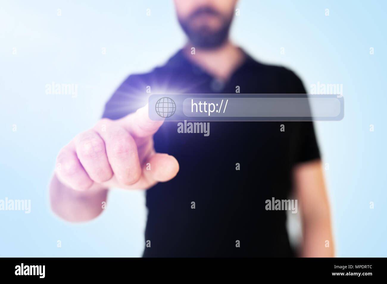 businessman touching browser address bar with globe icon on translucent interface Stock Photo
