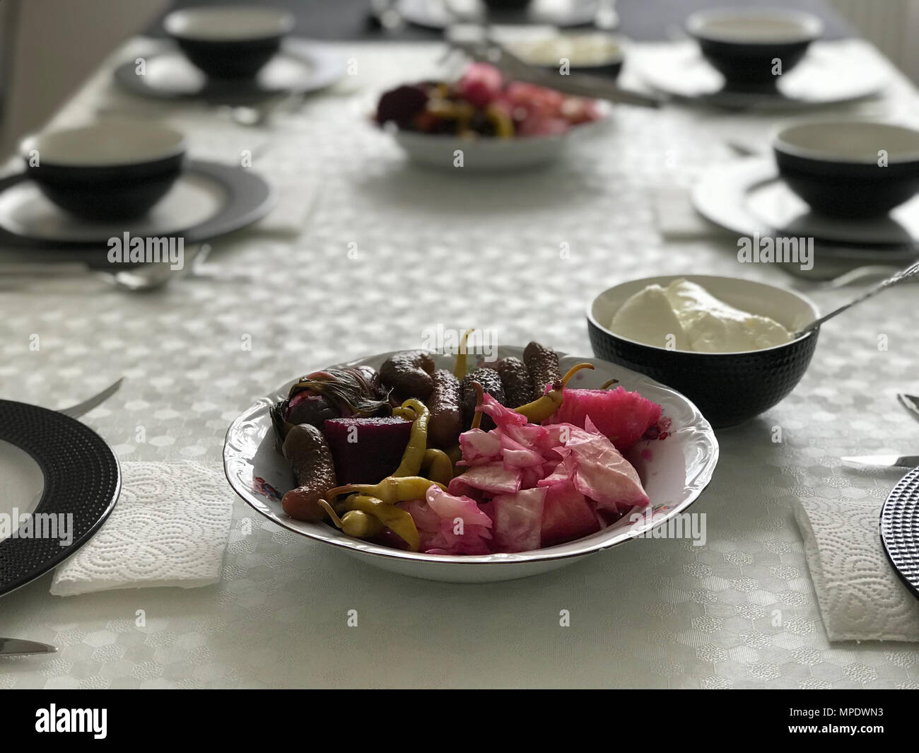 Turkish Pickle with Yogurt at Lunch Table. Homemade Pickled Food Stock