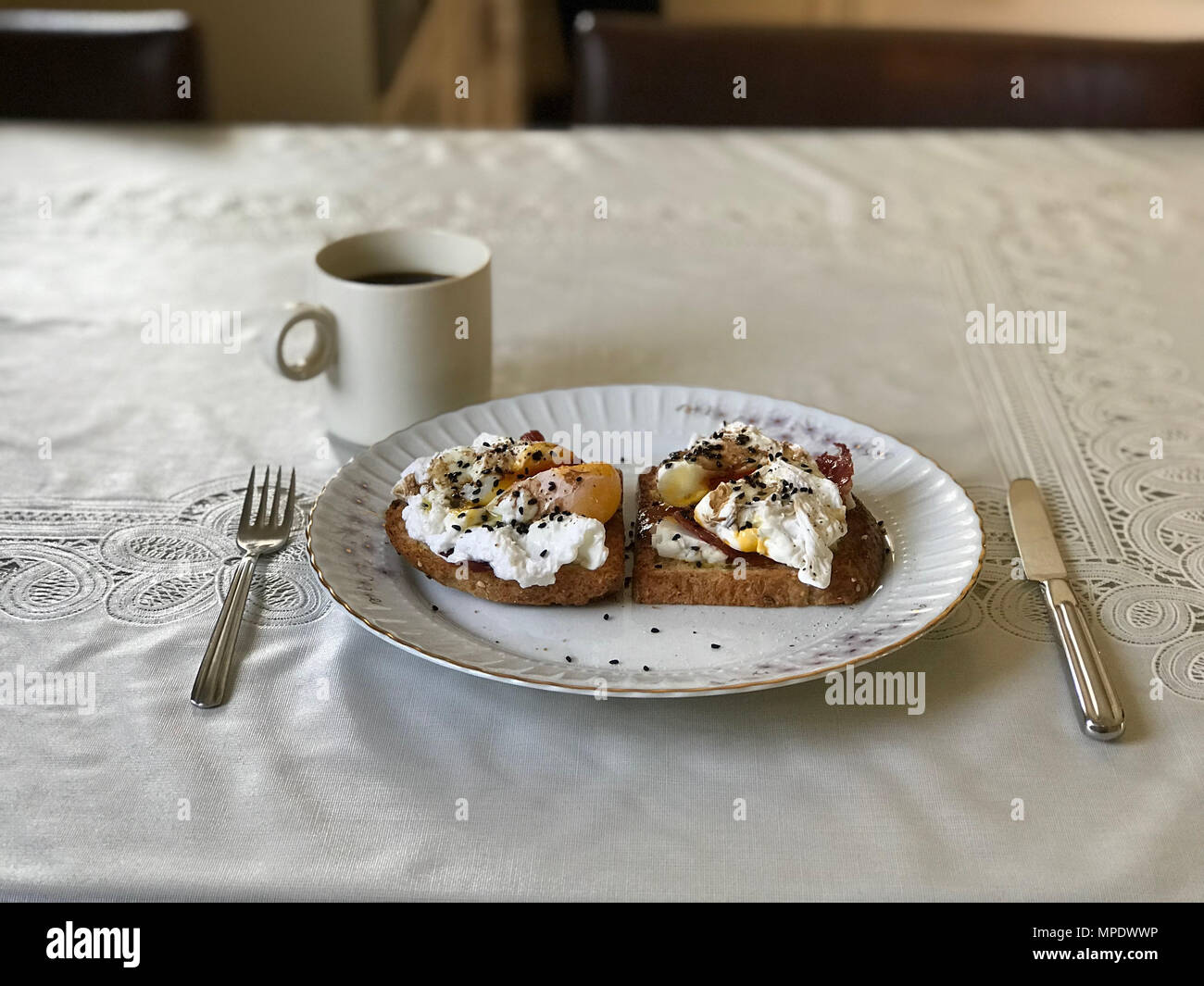 Poached Egg on Toast Bread with Cheddar Cheese, Balsamic Vinegar, Salad