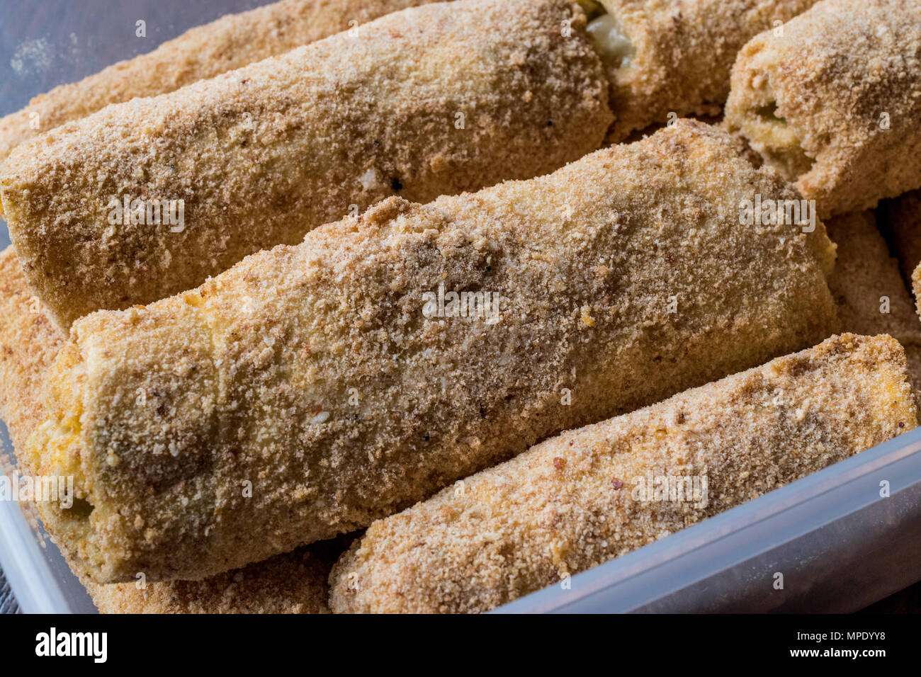 Raw Pastry with breadcrumbs / Chinese Egg Rolls / Borek Stock Photo Alamy