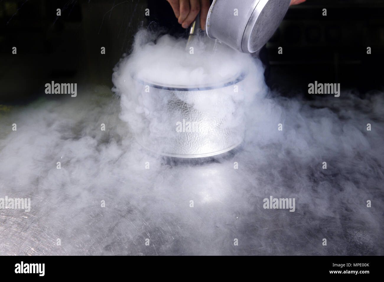 Making ice cream with liquid nitrogen, professional cooking Stock Photo