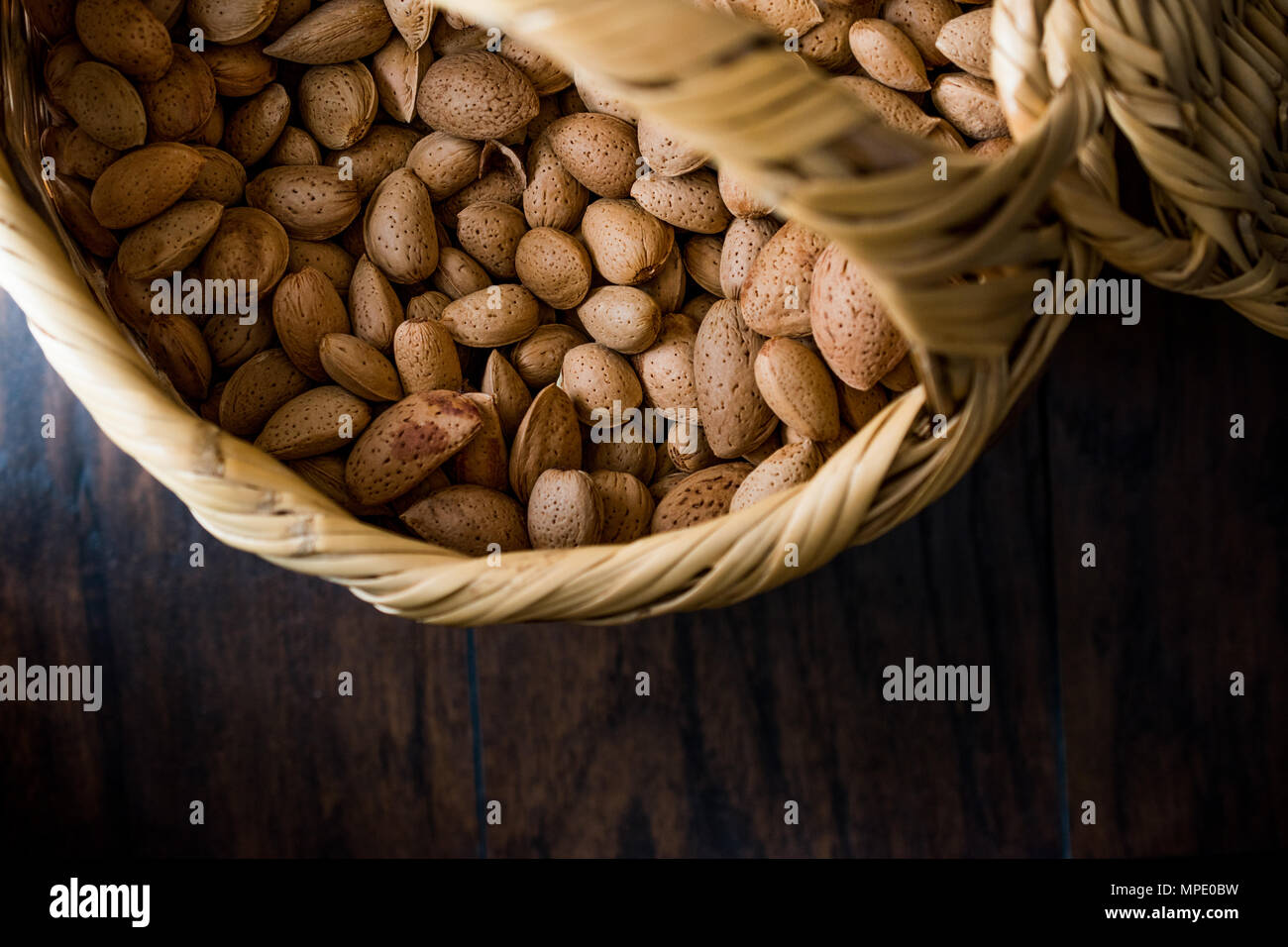 Fresh Organic Raw Almonds with Shell in Basket. Organic Food Stock ...