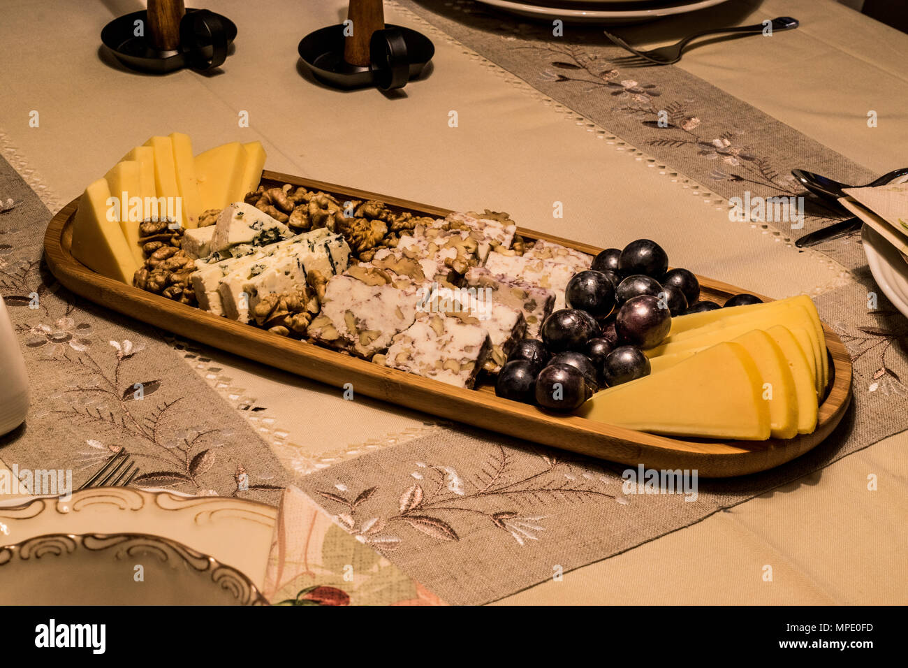 Cheese plate Emmental, Camembert cheese, blue cheese, cheddar, grape