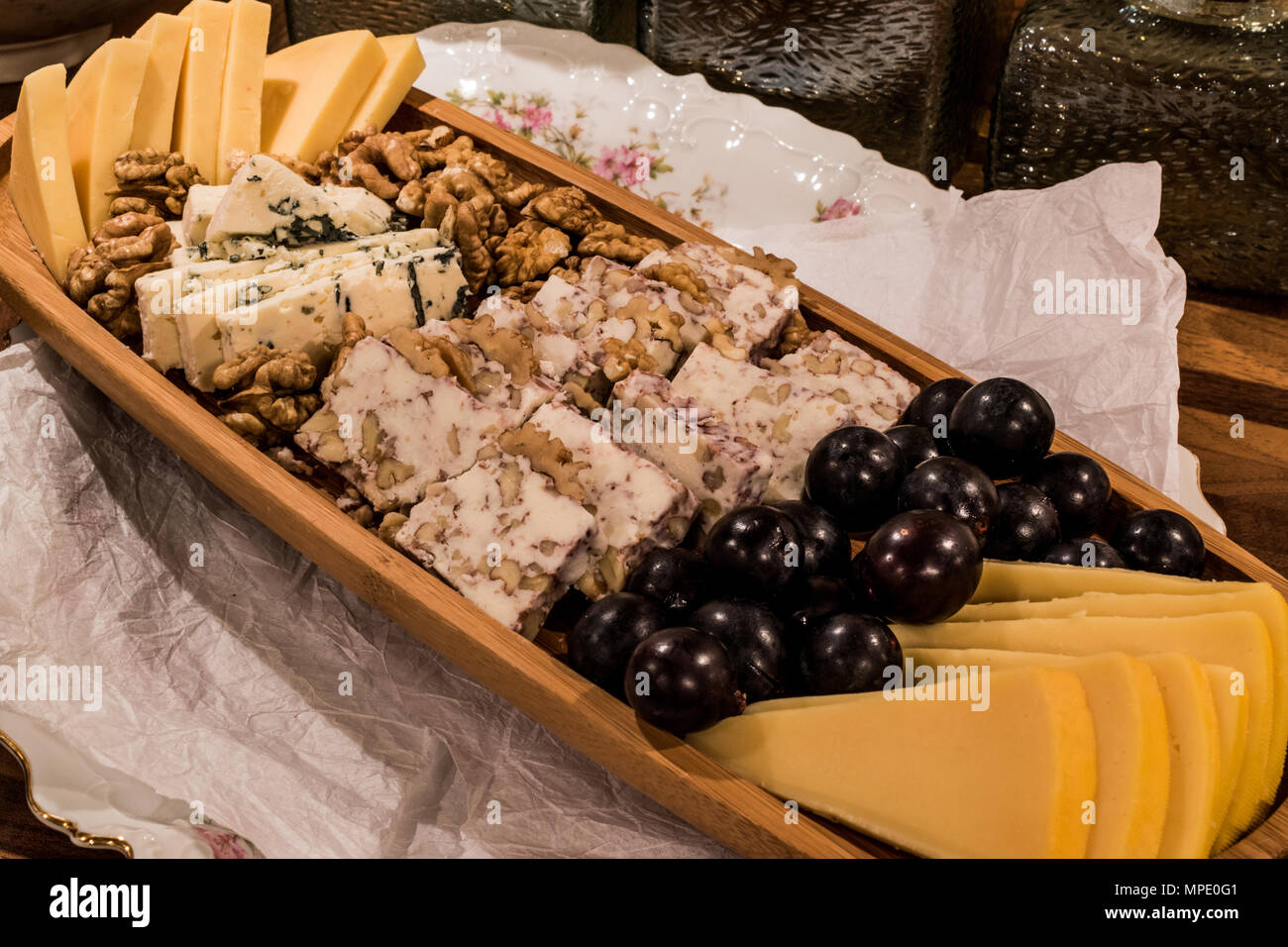 Cheese plate Emmental, Camembert cheese, blue cheese, cheddar, grape