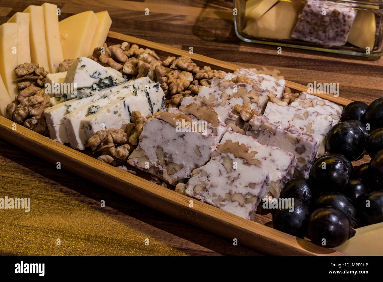 Cheese plate Emmental, Camembert cheese, blue cheese, cheddar, grape