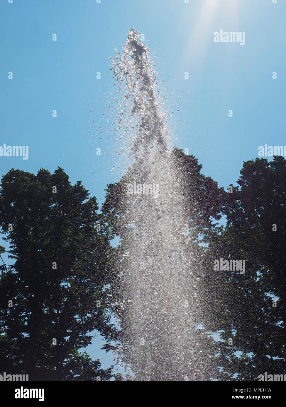 fountain jet of water high in the sky, high shutter speed freeze motion