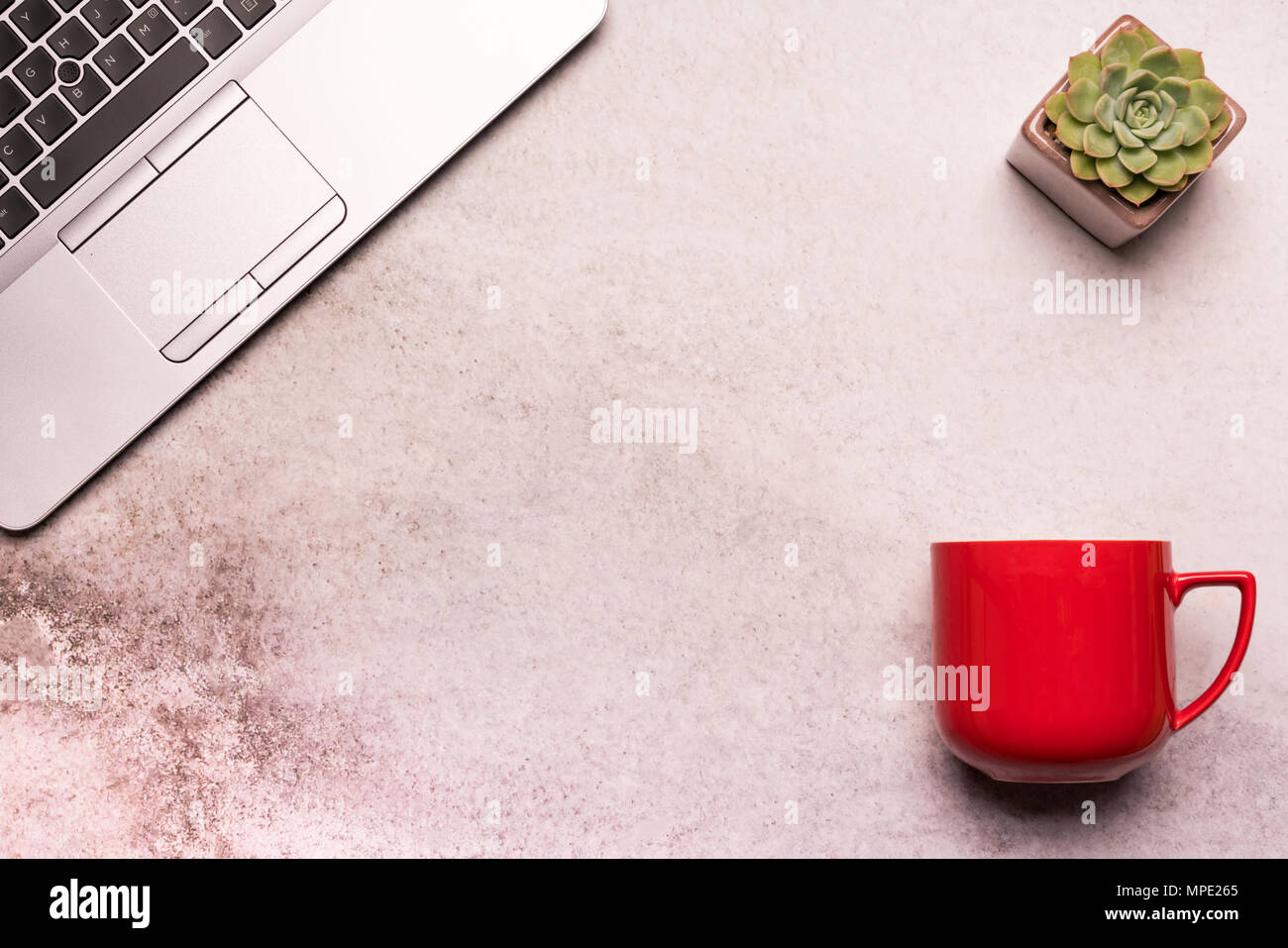 computer laptop on working table flat lay composition top view  with copy space Stock Photo