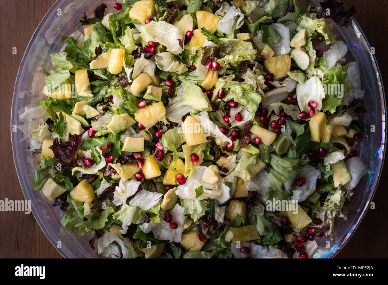 Fresh green organic salad in glass bowl. Stock Photo