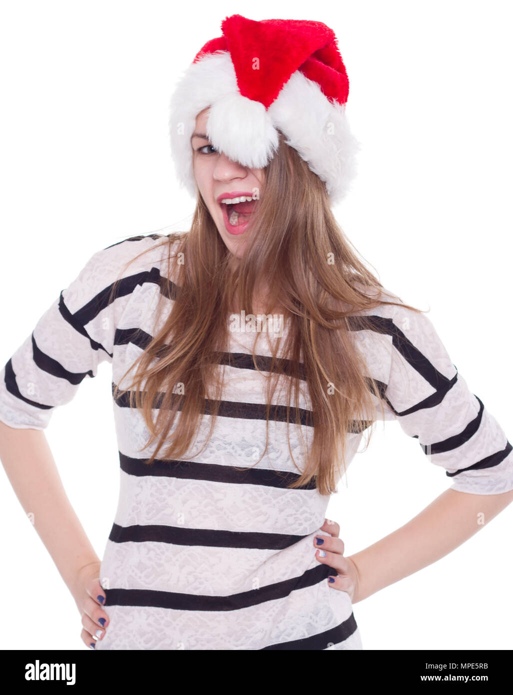 Portrait of joyful pretty woman in red santa claus hat laughing ...