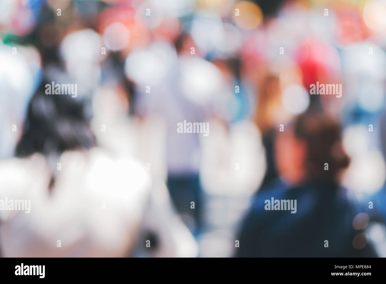 Blurred street crowd as abstract background as web site graphic design element Stock Photo