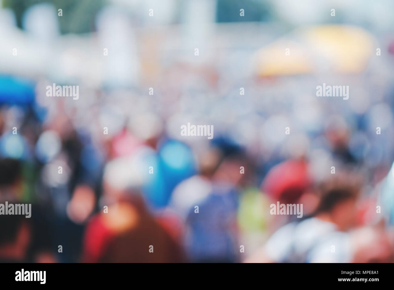 Blurred street crowd as abstract background as web site graphic design element Stock Photo