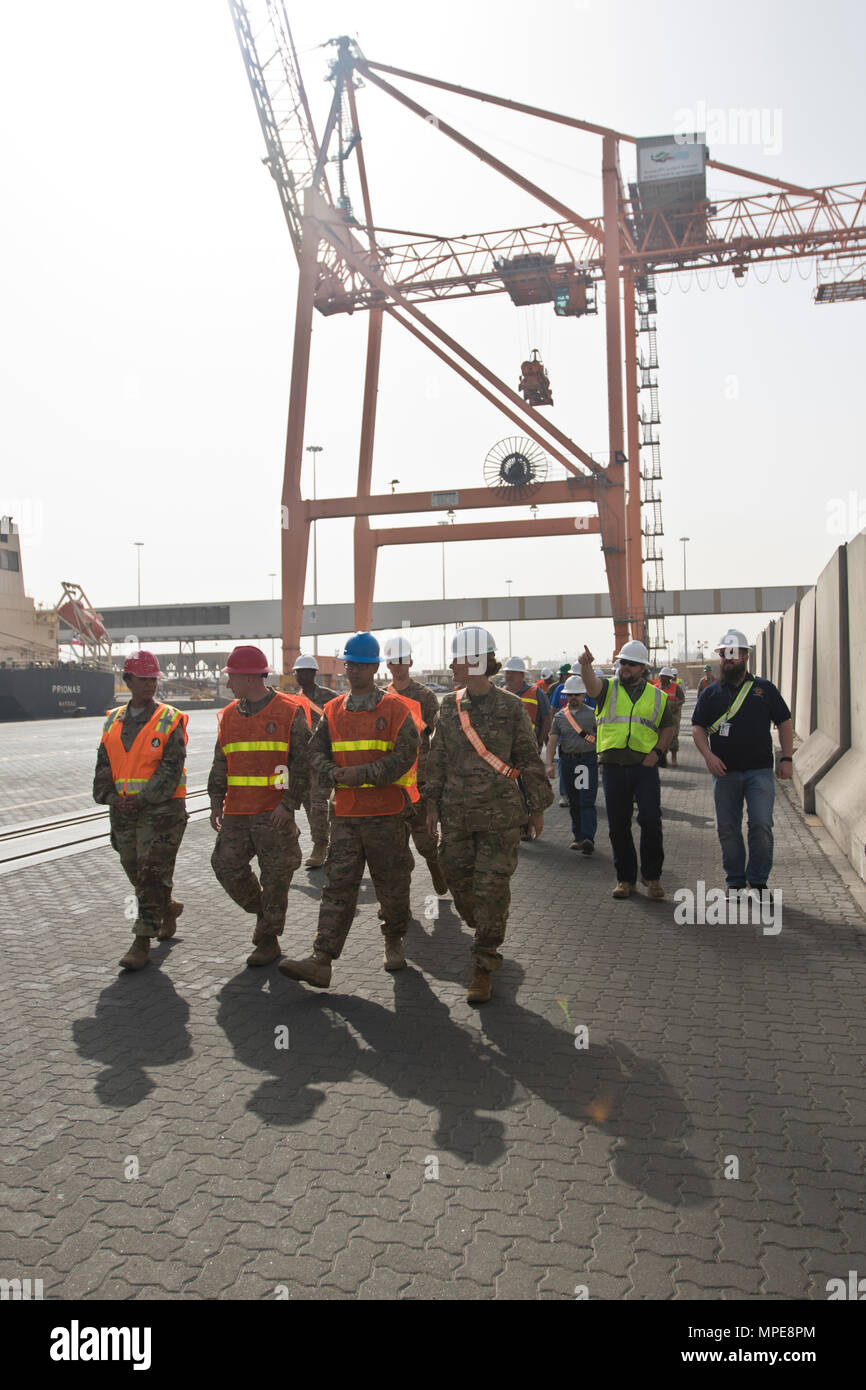 1st Sustainment Command (Theater) Soldiers and members of the U.S. Army Defense Ammunition Center review team review the safety procedures of vessel operations during the 2017 Worldwide Ammunition Logistics and Explosives Safety Review in Shuaiba Port, Kuwait, on Feb. 10., 2017 (U.S. Army photo by Staff Sgt. Dalton Smith) Stock Photo