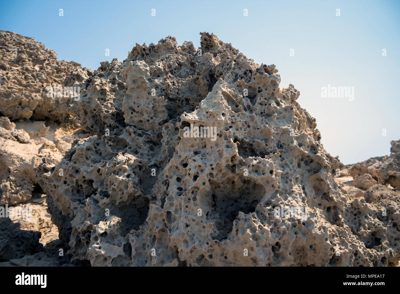 Course Porous Rock at Cape Greco Cyprus Stock Photo - Alamy