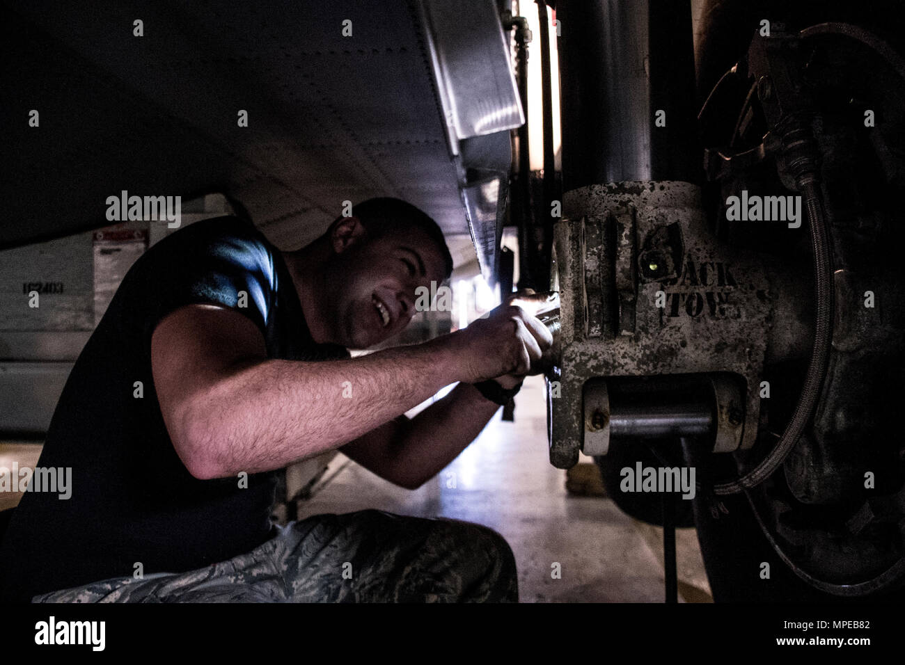 Tech. Sgt. Anthony Boscia from the 179th Airlift Wing, Mansfield, Ohio works on the anti-skid system to a C-130H Hercules during an isochronal inspection Feb. 10, 2017.  The 179th Airlift Wing is always on a mission to be the first choice to respond to community, state and federal missions with a trusted team of highly qualified Airmen. (U.S. Air National Guard photo by 1st Lt. Paul StennettReleased) Stock Photo