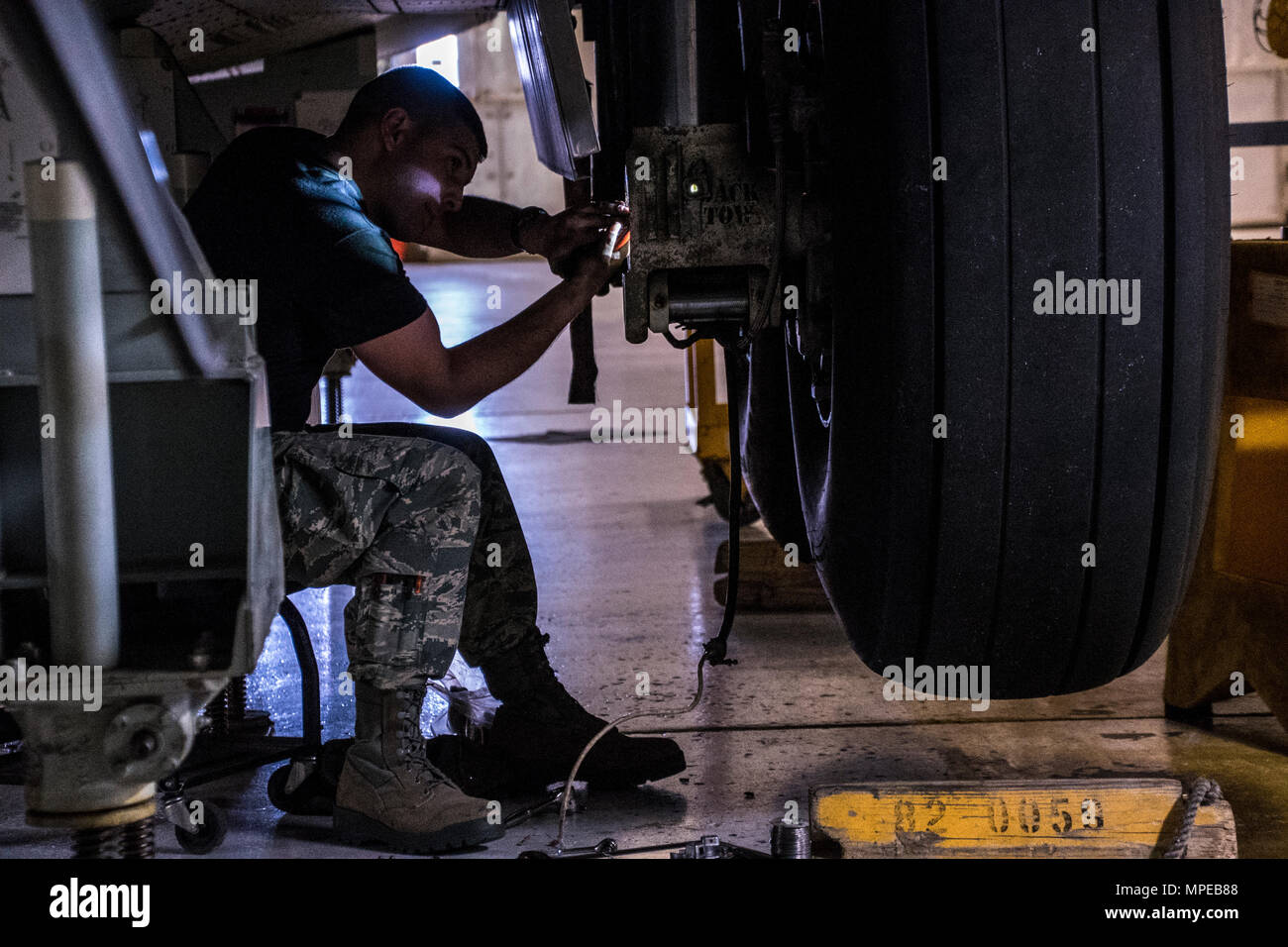 Tech. Sgt. Anthony Boscia from the 179th Airlift Wing, Mansfield, Ohio works on the anti-skid system to a C-130H Hercules during an isochronal inspection Feb. 10, 2017.  The 179th Airlift Wing is always on a mission to be the first choice to respond to community, state and federal missions with a trusted team of highly qualified Airmen. (U.S. Air National Guard photo by 1st Lt. Paul StennettReleased) Stock Photo