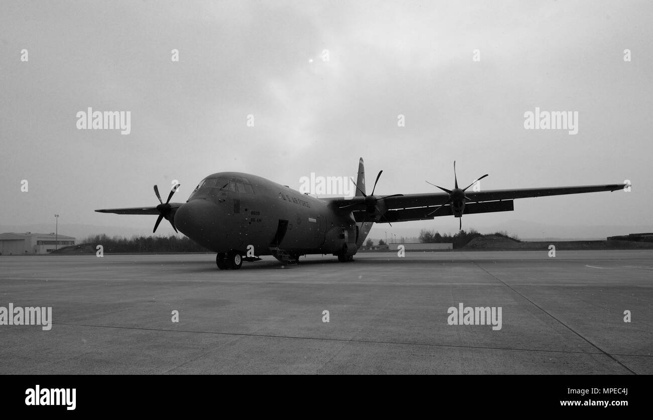 A 37th Airlift Squadron C-130J Super Hercules sits on the flightline on Ramstein Air Base, Germany, Feb. 10, 2017. The 37th AS has used a variety of aircraft since its activation as a unit in 1942, with the current aircraft being the C-130J. (U.S. Air Force photo by Airman 1st Class Joshua Magbanua) Stock Photo