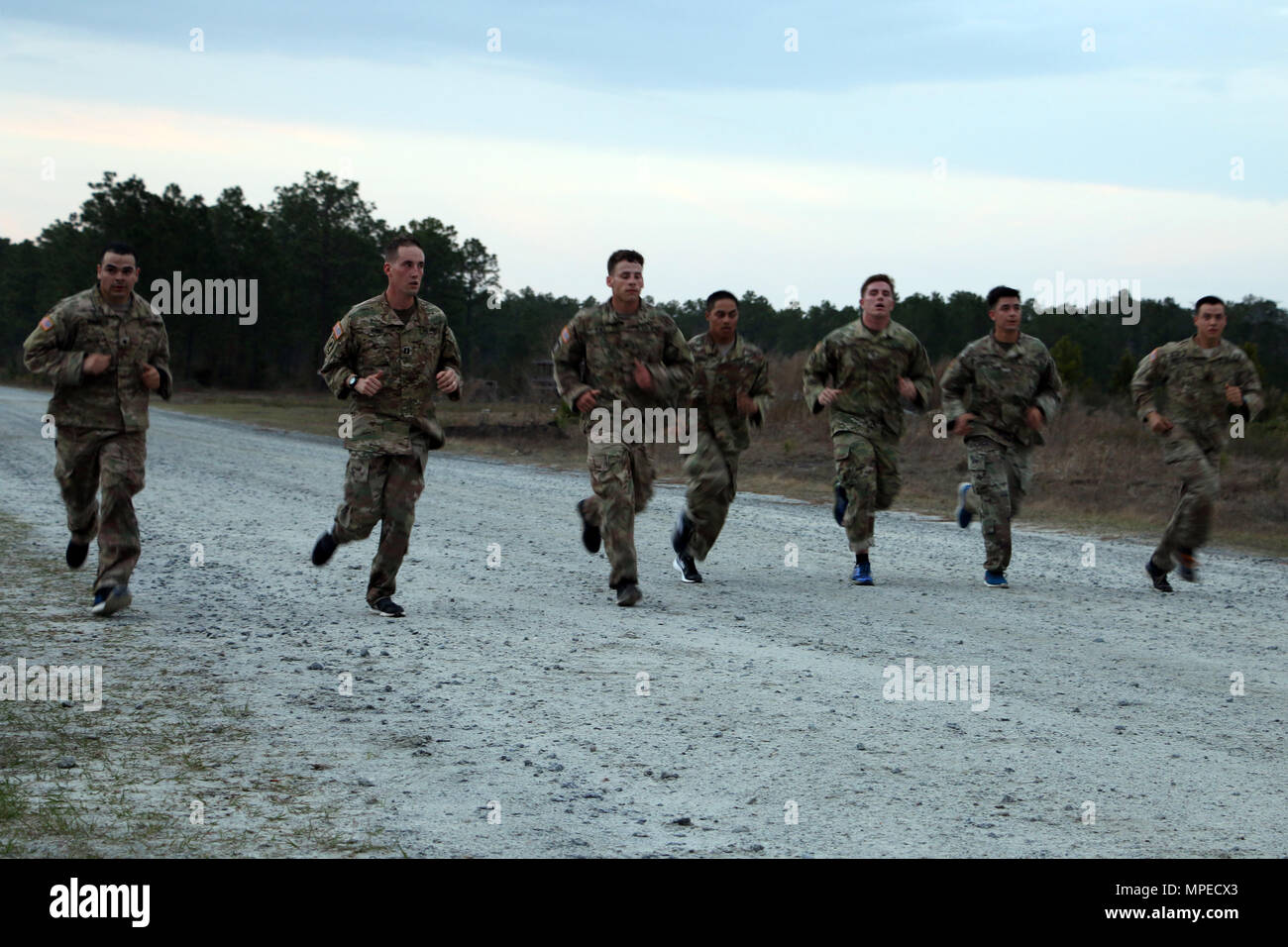 Soldiers of Bravo Troop, 6th Squadron, 8th Cavalry Regiment, 2nd Infantry Brigade Combat Team, 3rd Infantry Division near the end of a five-mile run February 8, 2017 at Fort Stewart, Ga. Troopers of 6-8 Cav. participated and hosted a selection to determine who would go on to compete for a spot in this year's biennial Gainey Cup competition. (U.S. Army photo by Sgt. Robert Harris/Released) Stock Photo