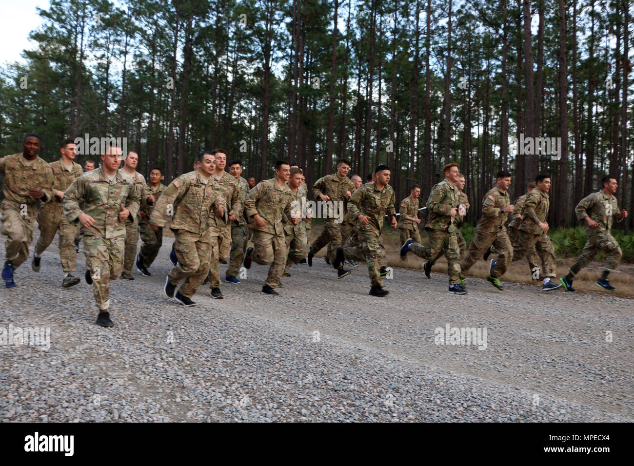 Soldiers of 6th Squadron, 8th Cavalry Regiment, 2nd Infantry Brigade Combat Team, 3rd Infantry Division begin a five-mile run February 8, 2017 at Fort Stewart, Ga. Troopers of 6-8 Cav. participated and hosted a selection to determine who would go on to compete for a spot in this year's biennial Gainey Cup competition. (U.S. Army photo by Sgt. Robert Harris/Released) Stock Photo